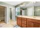 Spacious bathroom with double vanity, ample storage, and separate toilet and shower areas at 1304 Double Oak Ln, Willow Springs, NC 27592