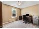 Cozy bedroom features a ceiling fan and a window that allows for lots of natural light at 1304 Double Oak Ln, Willow Springs, NC 27592