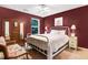 Cozy bedroom with a comfortable bed, floral armchair, and closet space at 1304 Double Oak Ln, Willow Springs, NC 27592