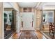 Inviting foyer with hardwood floors, natural light, and a view into the dining room at 1304 Double Oak Ln, Willow Springs, NC 27592