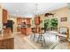 Open kitchen boasts an island, stainless steel appliances, and barstool seating at 1304 Double Oak Ln, Willow Springs, NC 27592