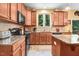 Modern kitchen features granite countertops, stainless steel appliances, and ample storage space at 1304 Double Oak Ln, Willow Springs, NC 27592