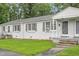 Charming brick duplex with well-maintained lawn and inviting entrance at 1400 Roslyn Dr # 17B, Burlington, NC 27215