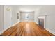 Inviting living room features refinished hardwood floors and a decorative fireplace at 1411 Hudson Ave, Durham, NC 27705