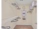 A well organized walk in closet features custom shelving at 1504 Haventree Rd, Durham, NC 27713