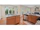 Spacious kitchen with granite countertops, stainless appliances, and hardwood floors at 1504 Haventree Rd, Durham, NC 27713