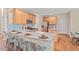 Stylish kitchen boasts a breakfast bar, stainless appliances, and ample counter space at 1504 Haventree Rd, Durham, NC 27713