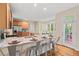 Bright kitchen offers stainless steel appliances, granite countertops, and breakfast nook at 1504 Haventree Rd, Durham, NC 27713