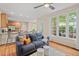 Inviting living room with ample natural light and open view of the modern kitchen at 1504 Haventree Rd, Durham, NC 27713