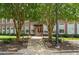 Attractive brick building with well-maintained landscaping, benches, and inviting entrance at 1535 Caraleigh Mills Ct # 210, Raleigh, NC 27603