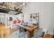 Bright dining area featuring an open layout and modern finishes, perfect for entertaining guests at 1535 Caraleigh Mills Ct # 210, Raleigh, NC 27603
