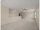 Open bonus room with neutral carpet and ample room for various activities at 1604 Carnation Dr, Durham, NC 27703