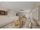 Large bonus room with sofa, dart board and foosball table for Gathering entertainment at 1604 Carnation Dr, Durham, NC 27703