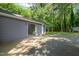 Exterior showcasing a sliding glass door to the backyard at 1605 Valley Run, Durham, NC 27707