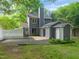 Charming backyard featuring a well-kept lawn and a view of the home's neutral siding at 1605 Valley Run, Durham, NC 27707
