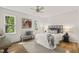 Bright bedroom with decorative throw pillows, bench and lots of natural light at 1605 Valley Run, Durham, NC 27707