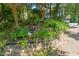 Lush landscaping and gardens enhancing the curb appeal of this home's front exterior at 1605 Valley Run, Durham, NC 27707