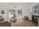 Bright living room with built-in shelving, fireplace, neutral colors, and ample natural light at 1605 Valley Run, Durham, NC 27707