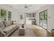 Spacious living room with built-in shelving, large sliding door, neutral colors, and stylish decor at 1605 Valley Run, Durham, NC 27707