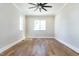 Bedroom with ceiling fan and hardwood floors at 162 Farmstead Ct, Wendell, NC 27591