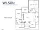 First floor floor plan featuring the Main Suite, kitchen, living room, dining and a covered back porch at 162 Farmstead Ct, Wendell, NC 27591