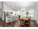 Bright, open kitchen features stainless steel appliances, granite countertops, and a breakfast bar with seating at 1711 Memory Ln, Burlington, NC 27217
