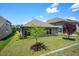 Landscaped backyard showcasing well-maintained lawn and attractive foliage at 1724 Capstone Dr, Durham, NC 27713