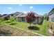 Spacious backyard with lush greenery, mature trees, and well-kept landscaping at 1724 Capstone Dr, Durham, NC 27713