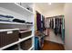 Well-organized walk-in closet with custom shelving and ample storage space at 1724 Capstone Dr, Durham, NC 27713
