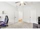 Spacious room featuring plush carpet and multiple doorways at 1928 Vandiver Way, Apex, NC 27523