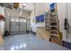 Well-organized garage with ample storage, featuring epoxy floors and a clean, functional layout at 1928 Vandiver Way, Apex, NC 27523