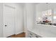 Hallway with adjacent office space and living room views at 1928 Vandiver Way, Apex, NC 27523