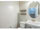 Powder room features vanity and mirror at 20 Sugarpine Trl, Clayton, NC 27520