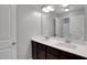 Bathroom featuring a double sink vanity with dark wood cabinets at 20 Sugarpine Trl, Clayton, NC 27520