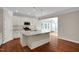 Modern kitchen with granite counters and stainless steel appliances at 20 Sugarpine Trl, Clayton, NC 27520