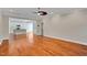 Bright living room with hardwood floors and open access to the kitchen at 20 Sugarpine Trl, Clayton, NC 27520