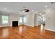 Bright living room with hardwood floors and fireplace at 20 Sugarpine Trl, Clayton, NC 27520