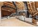 Unfinished attic with exposed beams, air ducts and plywood flooring at 202 Verrazano Pl, Clayton, NC 27520