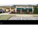 Clubhouse features professional landscaping, covered parking, and covered entryway at 202 Verrazano Pl, Clayton, NC 27520