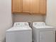 Convenient laundry room includes both a washer and dryer for easy laundry days at 202 Verrazano Pl, Clayton, NC 27520