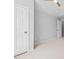 Bright bedroom featuring neutral carpet, two closets, and a ceiling fan at 2040 Persimmon Ridge Dr, Raleigh, NC 27604