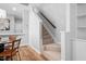 Inviting entryway features a staircase and flows into an open-concept dining and kitchen area at 2040 Persimmon Ridge Dr, Raleigh, NC 27604