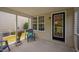 Cozy screened-in porch with comfortable seating and a view of the landscaped backyard at 2040 Persimmon Ridge Dr, Raleigh, NC 27604