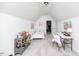 Bright bedroom features a single bed, workspace and gray hued carpet at 2100 Stone Pasture Rd, Fuquay Varina, NC 27526