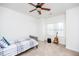 Comfortable bedroom with natural light, guitar and neutral carpet at 2100 Stone Pasture Rd, Fuquay Varina, NC 27526