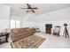 Bonus room area with neutral walls, ceiling fan, and traditional furniture at 2100 Stone Pasture Rd, Fuquay Varina, NC 27526