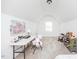 Versatile bonus room offers many uses, including painting and relaxation at 2100 Stone Pasture Rd, Fuquay Varina, NC 27526