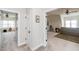 Upstairs hallway leads to other rooms with carpeting and neutral walls at 2100 Stone Pasture Rd, Fuquay Varina, NC 27526