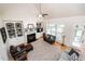 Open living room featuring a fireplace, built-in shelving, and ample seating space at 2100 Stone Pasture Rd, Fuquay Varina, NC 27526