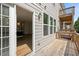 Back deck with views into the open kitchen; lovely siding at 214 George Pine Way, Knightdale, NC 27545